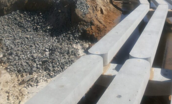 Load Bearing Capacities of Precast Concrete Beams for Heavy Infrastructure