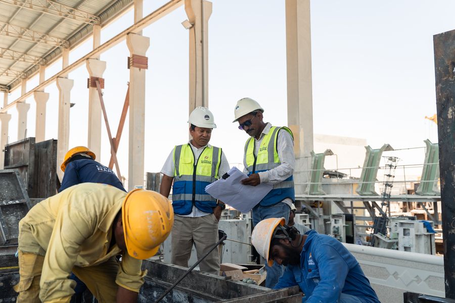 Engineers reviewing drawings