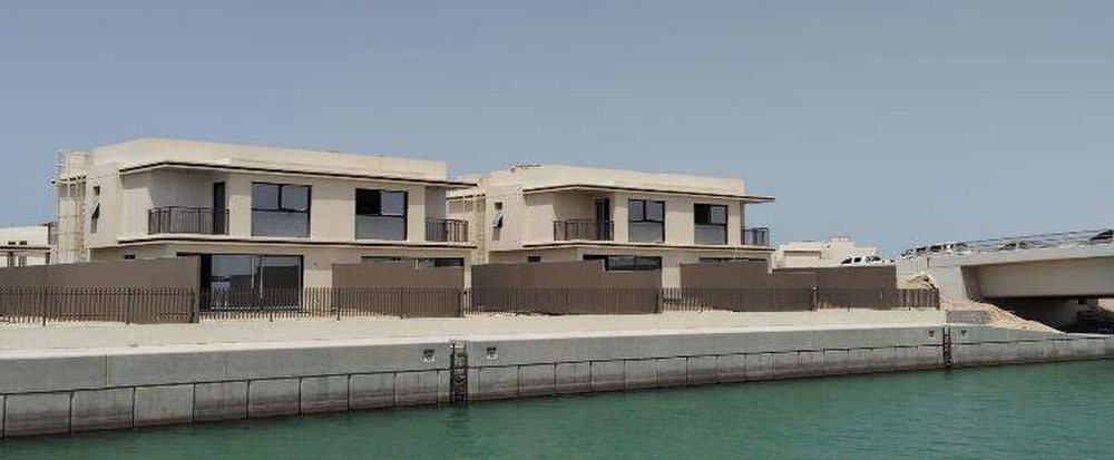 Falcon Island waterfront villa development with precast boundary walls